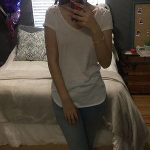 White top with shoulder details